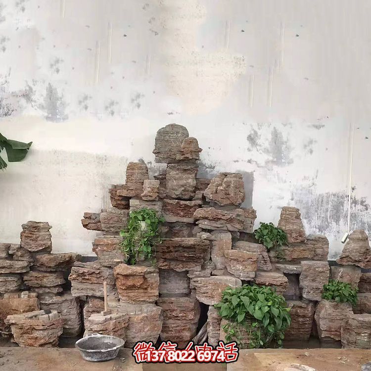 室內(nèi)景觀設(shè)計，精美石雕塑擺放奇石假山