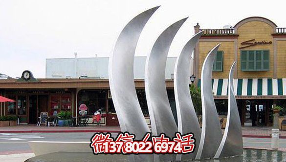 抽象不銹鋼翅膀雕塑將庭院與創(chuàng)意完美結合